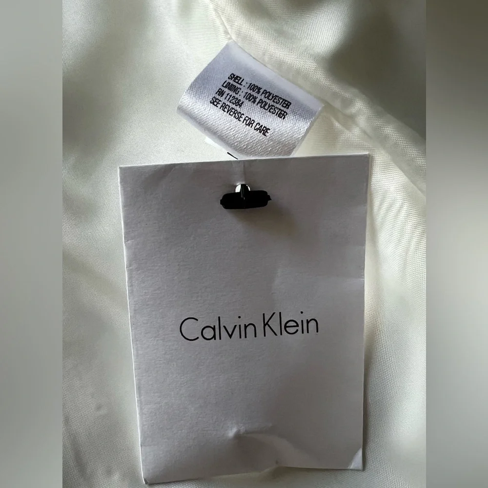Calvin Klein 2 piece suit (hypoallergenic Siberian cat not included) 😹 - Picture 9 of 12
